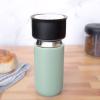 imageFellow 12 oz Carter Move Travel Mug  VacuumInsulated Stainless Steel Travel Coffee Mug  Coffee Tumbler with Ceramic Interior and Splash Guard  Mint ChipMint Chip