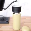 imageFellow 8 oz Carter Move Travel Mug  VacuumInsulated Stainless Steel Travel Coffee Mug  Coffee Tumbler with Ceramic Interior and Splash Guard  Matte BlackButtered Popcorn